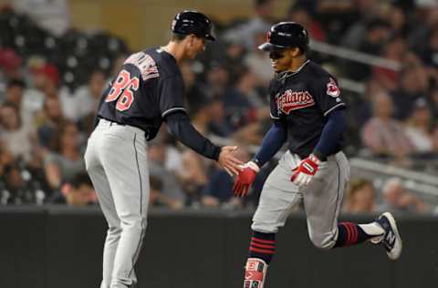 MINNEAPOLIS, MN – MAY 31: Third base coach Mike Sarbaugh #16 of the Cleveland Indians congratulates Francisco Lindor #12 on a solo home run against the Minnesota Twins during the eighth inning of the game on May 31, 2018 at Target Field in Minneapolis, Minnesota. The Indians defeated the Twins 9-8. (Photo by Hannah Foslien/Getty Images)