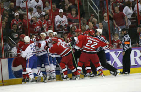 Apr 24, 2006; Raleigh, NC, USA; NHL Ice Hockey: fight during Game two of the first round of the NHL playoffs pitting the Montreal Canadiens against the Carolina Hurricanes April 24, 2006, at the RBC Center in Raleigh, NC. The Canandiens won 6-5 in double overtime. (Photo by Bob Leverone/Sporting News via Getty Images)