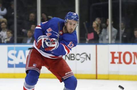 NEW YORK, NEW YORK – JANUARY 29: Kevin Hayes #13 of the New York Rangers shoots the puck into the Philadelphia Flyers end during the second period at Madison Square Garden on January 29, 2019 in New York City. (Photo by Bruce Bennett/Getty Images)