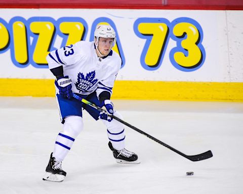 CALGARY, AB – JANUARY 24: Travis Dermott #23 of the Toronto Maple Leafs . (Photo by Derek Leung/Getty Images)