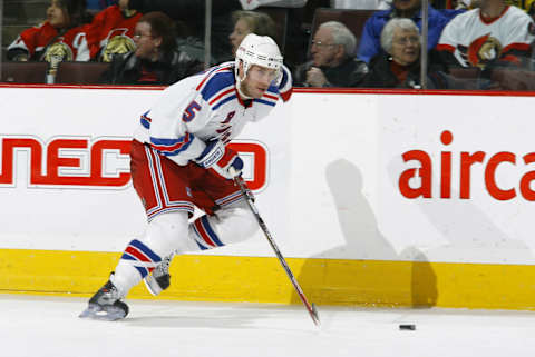 OTTAWA, CANADA – DECEMBER 29: Matt Cullen #5 of the New York Rangers carries the puck out of his zone up the far boards during a game against the Ottawa Senators on December 29, 2006 at the Scotiabank Place in Ottawa, Canada. The Senators won 1-0. (Photo by Phillip MacCallum/Getty Images)