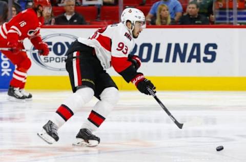 Mar 8, 2016; Raleigh, NC, USA; Ottawa Senators forward Mika Zibanejad (93) skates with the puck against the Carolina Hurricanes at PNC Arena. The Carolina Hurricanes defeated the Ottawa Senators 4-3 in a shootout. Mandatory Credit: James Guillory-USA TODAY Sports