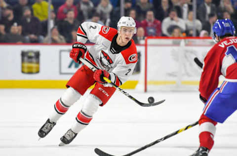 LAVAL, QC, CANADA – DECEMBER 28: Jake Bean #2 of the Charlotte Checkers in control of the puck on the tip of his blade against the Laval Rocket at Place Bell on December 28, 2018 in Laval, Quebec. (Photo by Stephane Dube /Getty Images)