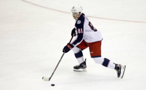 Sep 27, 2021; Pittsburgh, Pennsylvania, USA; Columbus Blue Jackets defenseman Stanislav Svozil (81) moves the puck against the Pittsburgh Penguins during the third period at PPG Paints Arena. Mandatory Credit: Charles LeClaire-USA TODAY Sports