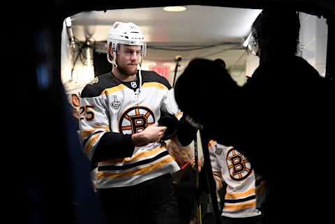 ST LOUIS, MISSOURI – JUNE 03: Brandon Carlo #25 of the Boston Bruins prepares to take the ice for warm ups before Game Four of the 2019 NHL Stanley Cup Final against the St. Louis Blues at Enterprise Center on June 03, 2019 in St Louis, Missouri. (Photo by Brian Babineau/NHLI via Getty Images)