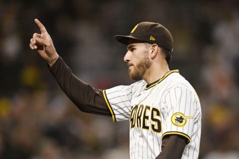 SAN DIEGO, CA – APRIL 14: Joe Musgrove #44 of the San Diego Padres points into the crowd as he leaves the game during the seventh inning of a baseball game against the Atlanta Braves at Petco Park on April 14, 2022 in San Diego, California. (Photo by Denis Poroy/Getty Images)