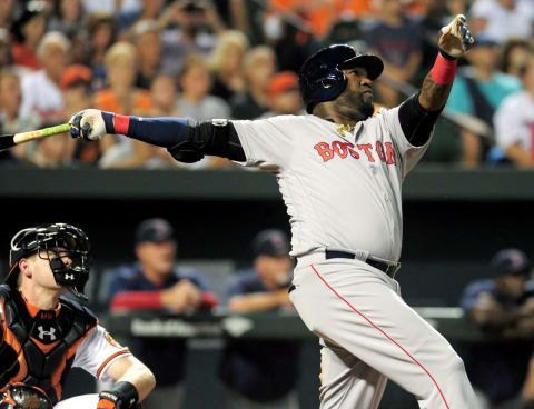 Sep 20, 2016; Baltimore, MD, USA; Boston Red Sox designated hitter David Ortiz (34) hits a home run in the seventh inning against the Baltimore Orioles at Oriole Park at Camden Yards. Mandatory Credit: Evan Habeeb-USA TODAY Sports