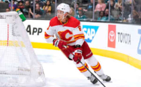 SAN JOSE, CALIFORNIA – APRIL 07: Juuso Valimaki #6 of the Calgary Flames skates with control of the puck from behind his goal against the San Jose Sharks during the second period of an NHL hockey game at SAP Center on April 07, 2022 in San Jose, California. (Photo by Thearon W. Henderson/Getty Images)