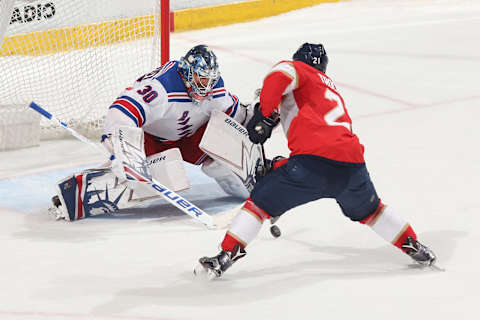 SUNRISE, FL – MARCH 10: Vincent Trocheck #21 of the Florida Panthers skates in on goaltender Henrik Lundqvist #30 of the New York Rangers to score the game winning goal in the shootout at the BB&T Center on March 10, 2018 in Sunrise, Florida. The Panthers defeated the Rangers 4-3 in a shootout. (Photo by Joel Auerbach/Getty Images)