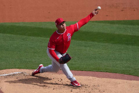 Mar 5, 2023; Surprise, Arizona, USA; Los Angeles Angels starting pitcher Jose Suarez (54) pitches against the Texas Rangers at Surprise Stadium. Mandatory Credit: Joe Camporeale-USA TODAY Sports