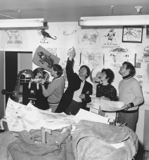 'Doctor Who' star Patrick Troughton with members of the BBC's 'Blue Peter' team sorting out children's designs for a new alien in 1967.