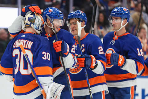 Oct 14, 2023; Elmont, New York, USA; The New York Islanders celebrate after defeating the Buffalo Sabres 3-2 at UBS Arena. Mandatory Credit: Wendell Cruz-USA TODAY Sports