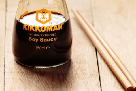 glass bottle of Kikkoman soy sauce.