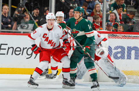 SAINT PAUL, MN – NOVEMBER 16: Andrei Svechnikov #37 of the Carolina Hurricanes defends Joel Eriksson Ek #14 of the Minnesota Wild during the game at the Xcel Energy Center on November 16, 2019, in Saint Paul, Minnesota. (Photo by Bruce Kluckhohn/NHLI via Getty Images)