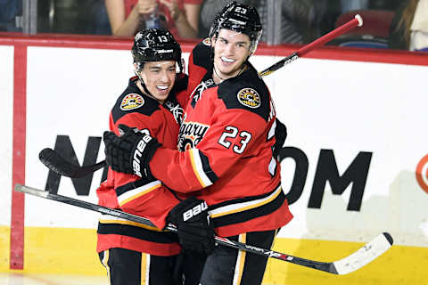 Mar 13, 2015; Calgary, Alberta, CAN; Calgary Flames center Sean Monahan (23) celebrates his second period goal with left wing Johnny Gaudreau (13) during the second period against the Toronto Maple Leafs at Scotiabank Saddledome. Mandatory Credit: Candice Ward-USA TODAY Sports