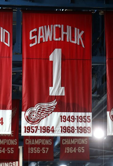 The retired number of former player Terry Sawchuk #1 of the Detroit Red Wings hangs from the rafters. (Photo by Tom Szczerbowski/Getty Images)