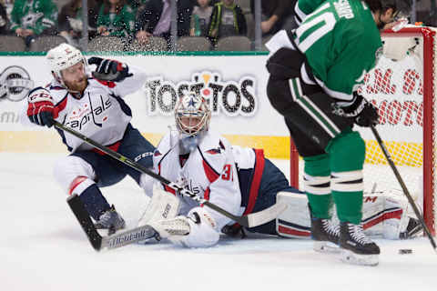 Jan 21, 2017; Dallas, TX, USA; Washington Capitals goalie Philipp Grubauer (31) and defenseman Karl Alzner (27) in action during the game against the Dallas Stars at the American Airlines Center. The Capitals defeat the Stars 4-3 in overtime. Mandatory Credit: Jerome Miron-USA TODAY Sports