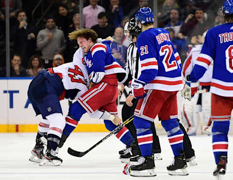 NEW YORK, NEW YORK – NOVEMBER 20: Tom Wilson #43 of the Washington Capitals and Brendan Lemieux #48 of the New York Rangers fight in the third period of their game at Madison Square Garden on November 20, 2019 in New York City. (Photo by Emilee Chinn/Getty Images)