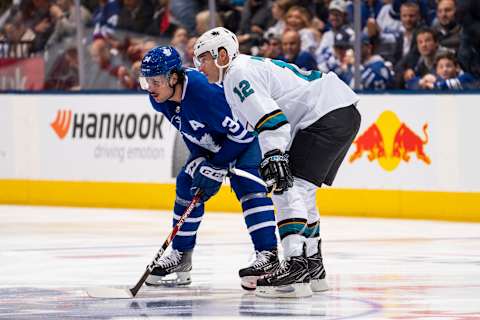 TORONTO, ON – OCTOBER 25: Auston Matthews #34 of the Toronto Maple Leafs lines up against Patrick Marleau #12 of the San Jose Sharks before the opening face-off at the start of the first period at the Scotiabank Arena on October 25, 2019 in Toronto, Ontario, Canada. (Photo by Mark Blinch/NHLI via Getty Images)