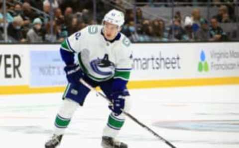 SEATTLE, WASHINGTON – OCTOBER 23: Quinn Hughes #43 of the Vancouver Canucks skates against the Seattle Kraken during the franchise’s inaugural home game at the Climate Pledge Arena on October 23, 2021 in Seattle, Washington. (Photo by Bruce Bennett/Getty Images)