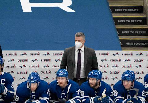 Feb 13, 2021; Toronto, Ontario, CAN; Toronto Maple Leafs head coach Sheldon Keefe looks on during the third period against the Montreal Canadiens at Scotiabank Arena. Mandatory Credit: Nick Turchiaro-USA TODAY Sports