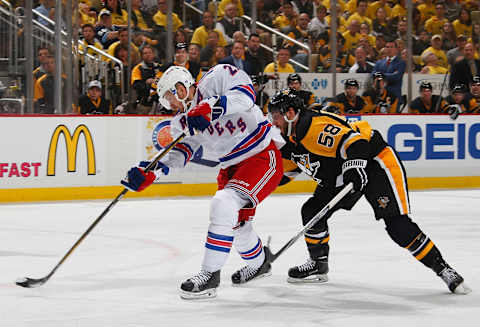 PITTSBURGH, PA – APRIL 16: Derek Stepan #21 of the New York Rangers takes a shot in front of Kris Letang #58 of the Pittsburgh Penguins in Game Two of the Eastern Conference Quarterfinals during the 2016 NHL Stanley Cup Playoffs at Consol Energy Center on April 16, 2016 in Pittsburgh, Pennsylvania. (Photo by Gregory Shamus/NHLI via Getty Images)