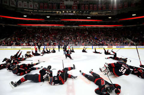 RALEIGH, NC – JANUARY 04: Players of the Carolina Hurricanes participate in their Storm Surge celebration following an NHL game against the Columbus Blue Jackets on January 4, 2019 at PNC Arena in Raleigh, North Carolina. (Photo by Gregg Forwerck/NHLI via Getty Images)