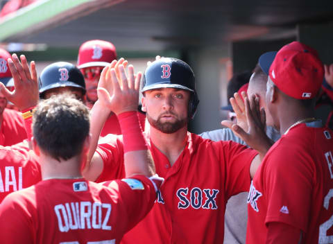 JUPITER, FL – MARCH 2: Sam Travis #59 of the Boston Red Sox is congratulated by teammates after hitting a home run against the St Louis Cardinals during the first inning of a spring training game at Roger Dean Chevrolet Stadium on March 2, 2018, in Jupiter, Florida. The Red Sox defeated the Cardinals 9-6. (Photo by Joel Auerbach/Getty Images)