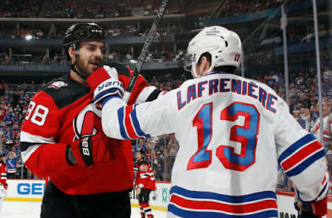 NEWARK, NEW JERSEY – APRIL 20: Kevin Bahl #88 of the New Jersey Devils and Alexis Lafreniere #13 of the New York Rangers exchange words during the third period during Game Two in the First Round of the 2023 Stanley Cup Playoffs at the Prudential Center on April 20, 2023, in Newark, New Jersey. (Photo by Bruce Bennett/Getty Images)