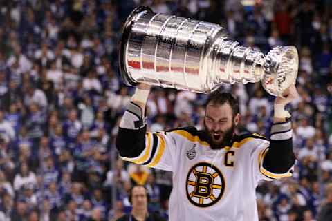 VANCOUVER, BC – JUNE 15: Zdeno Chara #33 of the Boston Bruins celebrates with the Stanley Cup after defeating the Vancouver Canucks in Game Seven of the 2011 NHL Stanley Cup Final at Rogers Arena on June 15, 2011 in Vancouver, British Columbia, Canada. The Boston Bruins defeated the Vancouver Canucks 4 to 0. (Photo by Elsa/Getty Images)