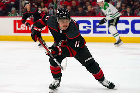 Mar 24, 2022; Raleigh, North Carolina, USA; Carolina Hurricanes center Max Domi (13) skates against the Dallas Stars during the first period at PNC Arena. Mandatory Credit: James Guillory-USA TODAY Sports