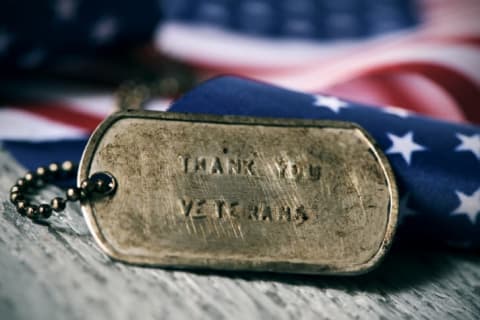 military dog tag that says