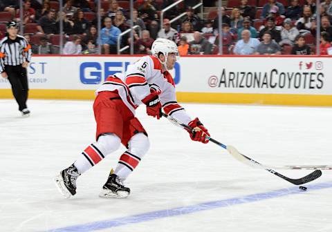 GLENDALE, AZ – NOVEMBER 04: Noah Hanifin #5 of the Carolina Hurricanes skates with the puck against the Arizona Coyotes at Gila River Arena on November 4, 2017 in Glendale, Arizona. (Photo by Norm Hall/NHLI via Getty Images)