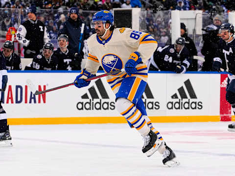 Mar 13, 2022; Hamilton, Ontario, CAN; Buffalo Sabres forward Alex Tuch (89) skates against the Toronto Maple Leafs during the first period in the 2022 Heritage Classic ice hockey game at Tim Hortons Field. Mandatory Credit: John E. Sokolowski-USA TODAY Sports