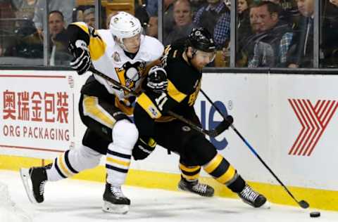 BOSTON, MA – JANUARY 26: Pittsburgh Penguins defenseman Olli Maatta (3) pressures Boston Bruins right wing Jimmy Hayes (11) during a regular season NHL game between the Boston Bruins and the Pittsburgh Penguins on January 26, 2017 at TD Garden in Boston, Massachusetts. The Bruins defeated the Penguins 4-3. (Photo by Fred Kfoury III/Icon Sportswire via Getty Images)