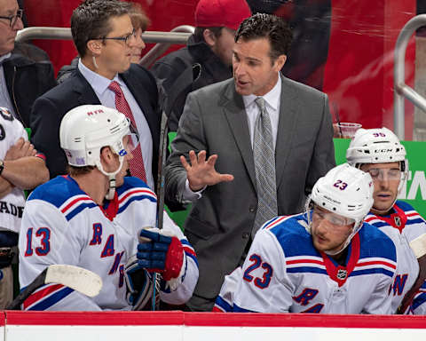 DETROIT, MI – NOVEMBER 09: David Quinn of the New York Rangers talks to Kevin Hayes #13 on the bench against the Detroit Red Wings during an NHL game at Little Caesars Arena on November 9, 2018 in Detroit, Michigan. The Wings defeated the Rangers 3-2 in overtime. (Photo by Dave Reginek/NHLI via Getty Images)