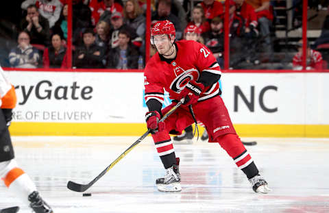 RALEIGH, NC – MARCH 17: Brett Pesce #22 of the Carolina Hurricanes skates with the puck during an NHL game against the Philadelphia Flyers on March 17, 2018 at PNC Arena in Raleigh, North Carolina. (Photo by Gregg Forwerck/NHLI via Getty Images)