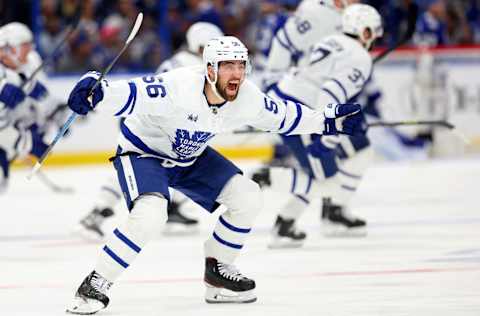 TAMPA, FLORIDA – APRIL 29: Erik Gustafsson #56 of the Toronto Maple Leafs celebrate winning Game Six of the First Round of the 2023 Stanley Cup Playoffs on an overtime goal by John Tavares #91 against the Tampa Bay Lightning at Amalie Arena on April 29, 2023, in Tampa, Florida. (Photo by Mike Ehrmann/Getty Images)