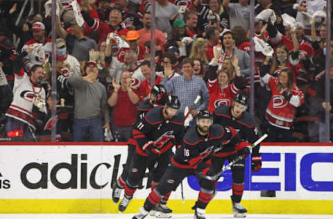 RALEIGH, NORTH CAROLINA – MAY 26: Vincent Trocheck #16 of the Carolina Hurricanes celebrates his goal against the New York Rangers in Game Five of the Second Round of the 2022 Stanley Cup Playoffs at PNC Arena on May 26, 2022, in Raleigh, North Carolina. (Photo by Bruce Bennett/Getty Images)