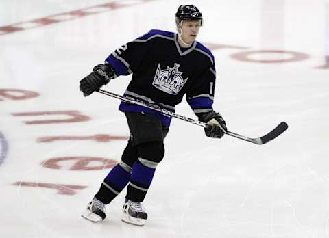 LOS ANGELES – NOVEMBER 25: Forward Esa Pirnes, #12 of the Los Angeles Kings, warms up before taking on the New Jersey Devils on November 25, 2003, at Staples Center in Los Angeles, California. The Devils defeated the Kings 3-0. (Photo by Victor Decolongon/Getty Images)