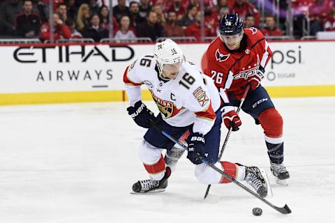 WASHINGTON, DC – FEBRUARY 09: Aleksander Barkov #16 of the Florida Panthers controls the puck against Nic Dowd #26 of the Washington Capitals in the third period at Capital One Arena on February 9, 2019 in Washington, DC. (Photo by Patrick McDermott/NHLI via Getty Images)