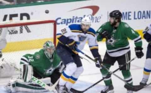 Apr 29, 2016; Dallas, TX, USA; St. Louis Blues center Patrik Berglund (21) looks for the puck as Dallas Stars goalie Kari Lehtonen (32) and defenseman Jason Demers (4) defend during the third period in game one of the second round of the 2016 Stanley Cup Playoffs at the American Airlines Center. The Stars defeat the Blue 2-1. Mandatory Credit: Jerome Miron-USA TODAY Sports