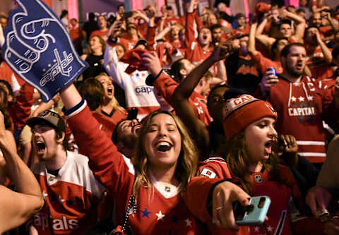 WASHINGTON, DC – JUNE 2: Washington Capitals fans celebrate after the team won Game 3 of the Stanley Cup Finals between the Washington Capitals and the Vegas Golden Knights at Capital One Arena on June 2, 2018. (Photo by Ricky Carioti/The Washington Post via Getty Images)