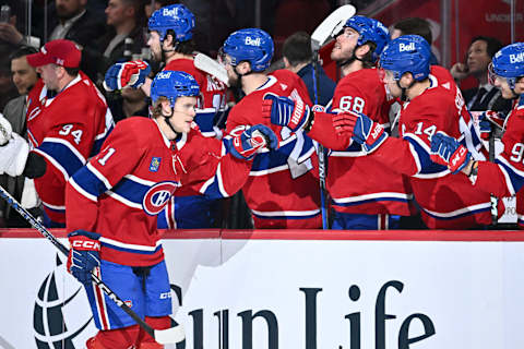 MONTREAL, CANADA – MARCH 09: Kaiden Guhle #21 of the Montreal Canadiens celebrates his goal with teammates on the bench during the first period against the New York Rangers at Centre Bell on March 9, 2023 in Montreal, Quebec, Canada. Photo by Minas Panagiotakis/Getty Images)