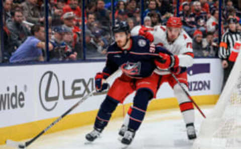 Jan 7, 2023; Columbus, Ohio, USA; Columbus Blue Jackets center Jack Roslovic (96) skates with the puck against Carolina Hurricanes defenseman Brady Skjei (76) in the second period at Nationwide Arena. Mandatory Credit: Aaron Doster-USA TODAY Sports