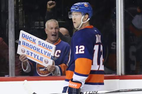 Oct 16, 2016; Brooklyn, NY, USA; New York Islanders right wing Josh Bailey (12) celebrates scoring the game winning goal in overtime against the Anaheim Ducks at Barclays Center. New York Islanders won 3-2 in overtime. Mandatory Credit: Anthony Gruppuso-USA TODAY Sports