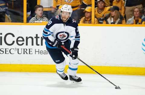 NASHVILLE, TN – APRIL 29: Toby Enstrom #39 of the Winnipeg Jets skates against the Nashville Predators in Game Two of the Western Conference Second Round during the 2018 NHL Stanley Cup Playoffs at Bridgestone Arena on April 29, 2018 in Nashville, Tennessee. (Photo by John Russell/NHLI via Getty Images) *** Local Caption *** Toby Enstrom