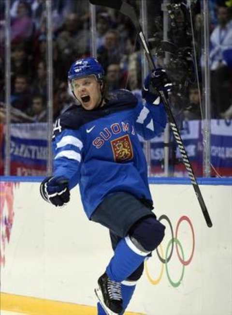 Feb 19, 2014; Sochi, RUSSIA; Finland forward Mikael Granlund (64) celebrates after scoring a goal against Russia in the men’s ice hockey quarterfinals during the Sochi 2014 Olympic Winter Games at Bolshoy Ice Dome.