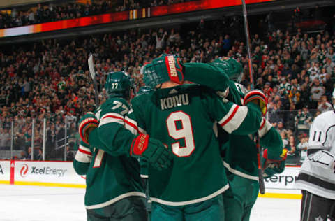 SAINT PAUL, MN – OCTOBER 26: (L-R) Brad Hunt #77, Mikko Koivu #9 and Marcus Foligno #17 of the Minnesota Wild celebrate after scoring a goal against the Los Angeles Kings during the game at the Xcel Energy Center on October 26, 2019, in Saint Paul, Minnesota. (Photo by Bruce Kluckhohn/NHLI via Getty Images)