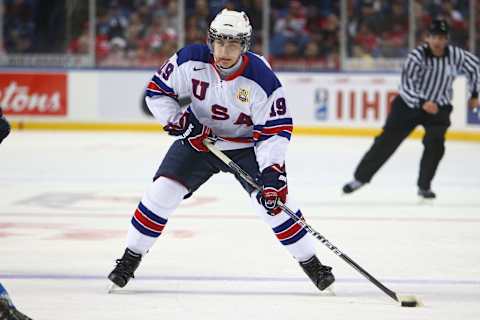 BUFFALO, NY – DECEMBER 26: Chris Kreider #15 of USA carrirs the puck during the 2011 IIHF World U20 Championship Group A game between USA and Finland on December 26, 2010 at HSBC Arena in Buffalo, New York. (Photo by Tom Szczerbowski/Getty Images)